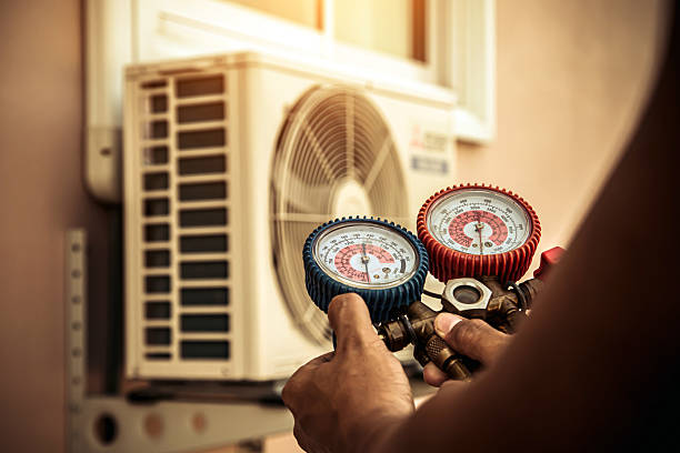 Professional Air Conditioning Service technician working in Slaughter, LA